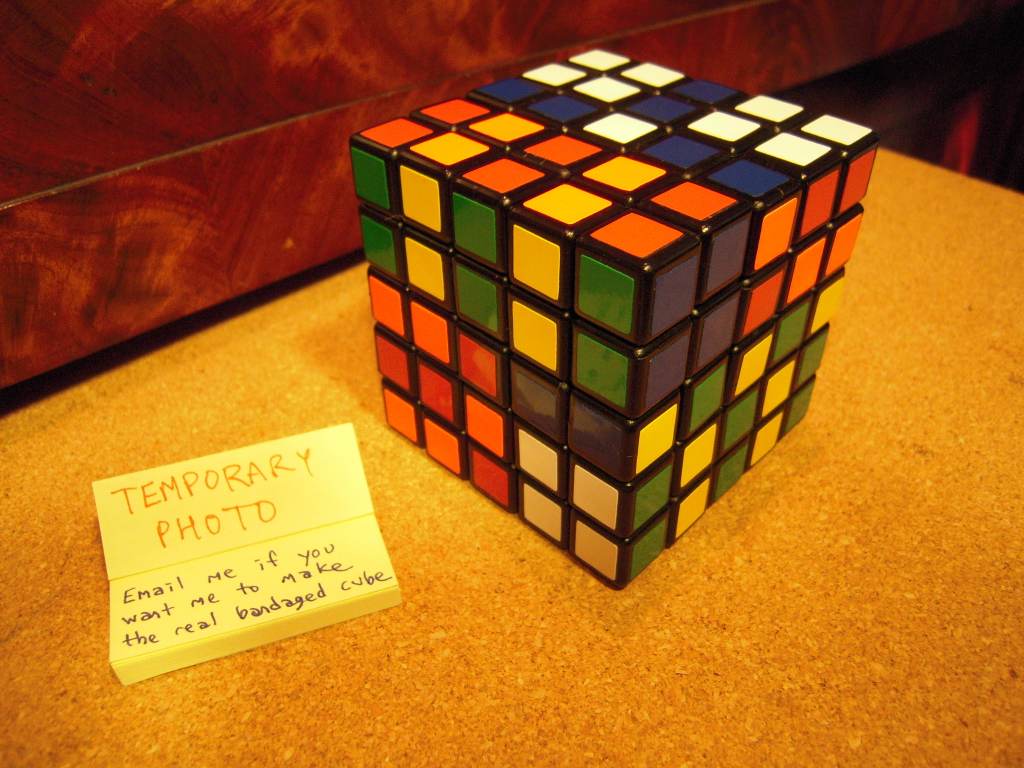 bandaged cube in a pattern corresponding to a shapeshifted form of the real 3&times;3&times;5